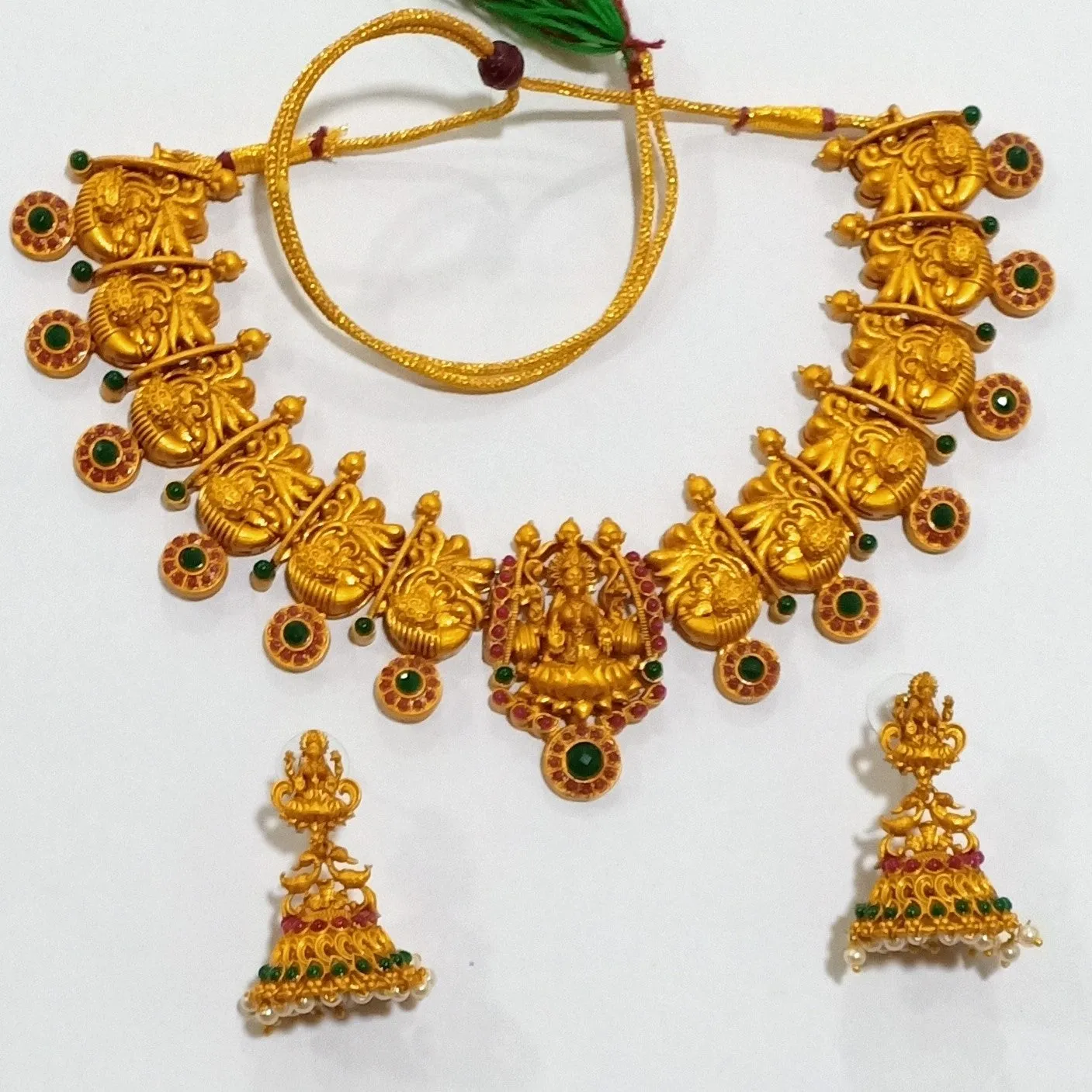 Estele Gold Plated Divinely Crafted Lakshmi Ji Matt Finish Temple Necklace Set with Colored Stones and Pearls for Women