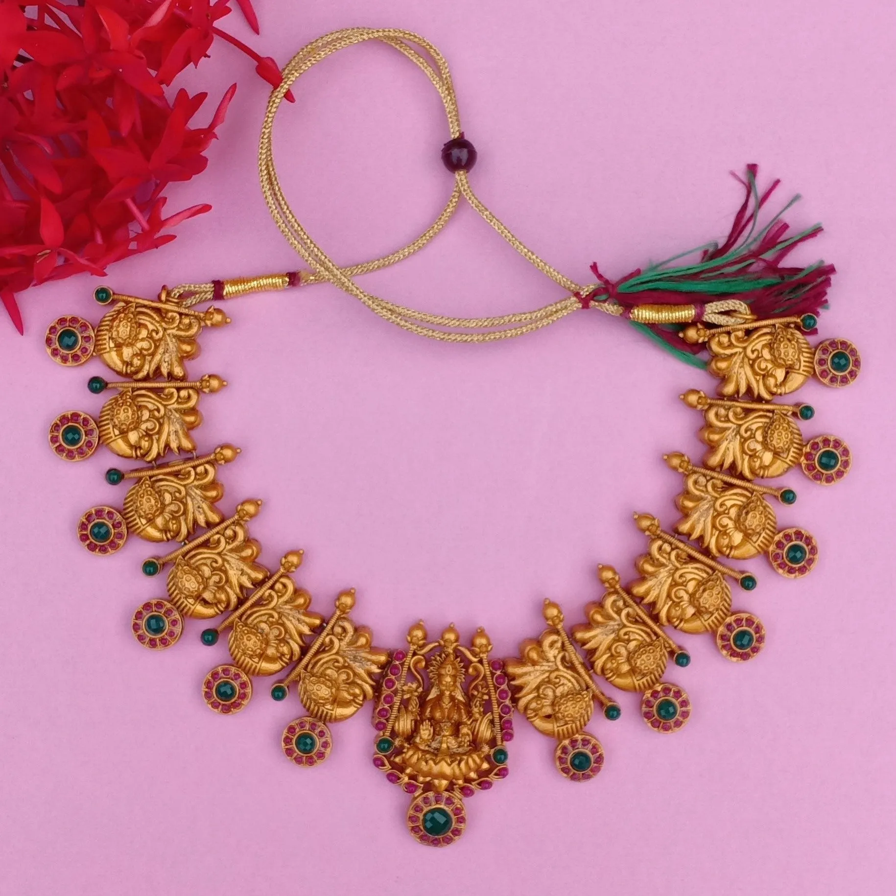 Estele Gold Plated Divinely Crafted Lakshmi Ji Matt Finish Temple Necklace Set with Colored Stones and Pearls for Women